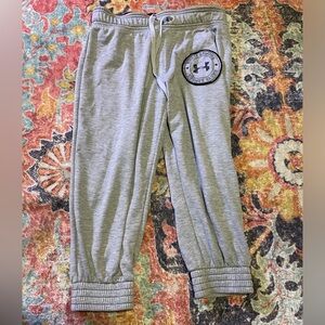 Grey Under Armour thick cuff capris with blue accent. Size small EUC